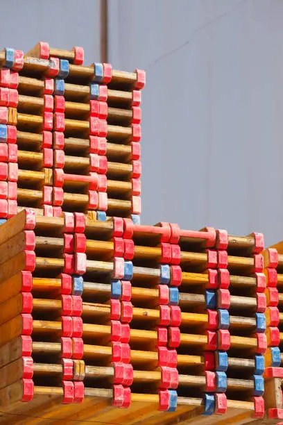 Stacked wooden boards on a construction site