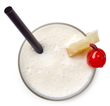 Glass of Pina Colada cocktail isolated on white background. From top view