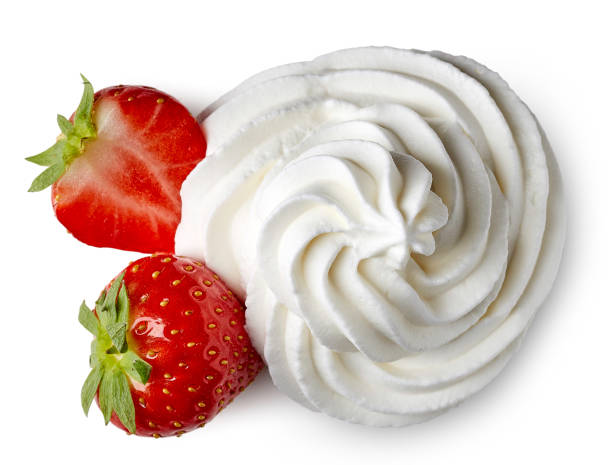 Whipped cream and strawberries