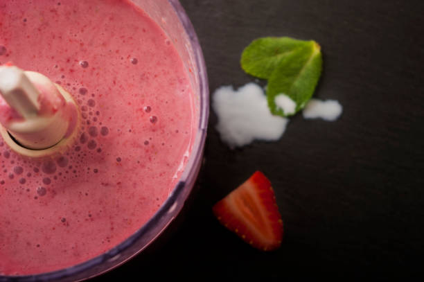 istock Fresh strawberry and banana smoothie 673498552