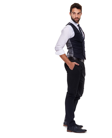 Full length shot of a well dressed young man against a white background