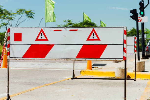 istock Fence warning sign on a street 673502314