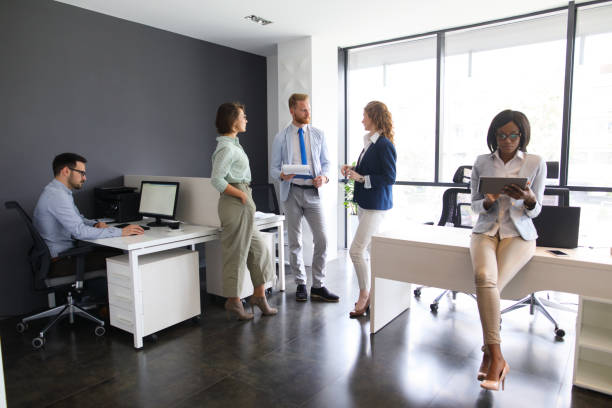 istock Young startup business people working in modern office 673504052