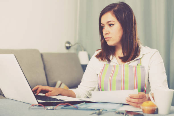 istock Housewife searching for recipes 673505300