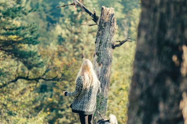 istock Young Woman Enjoying Time with Pet Dog 673517702