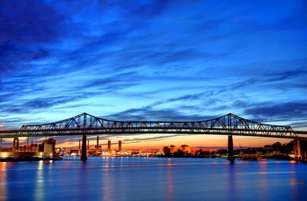 Tobin Bridge, Boston The Maurice J. Tobin Memorial Bridge is a cantilever truss bridge that spans more than two miles from Boston to Chelsea over the Mystic River in Massachusetts. tobin bridge boston ma stock pictures, royalty-free photos & images