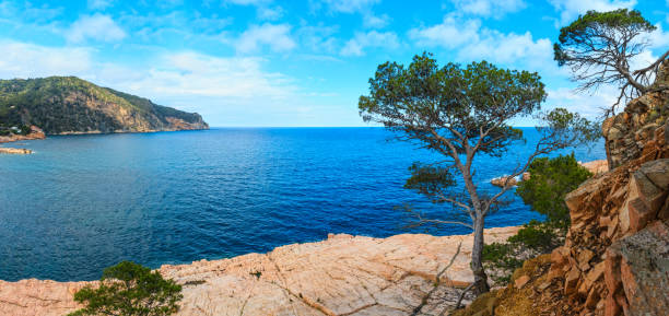istock Summer sea rocky coast view (Spain). 673521660