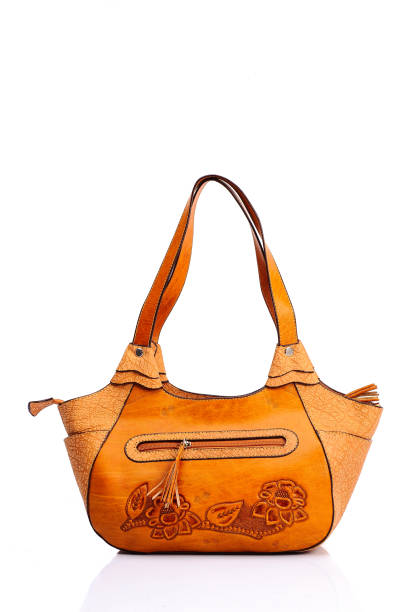 istock Leather female bag on a white background 673532044