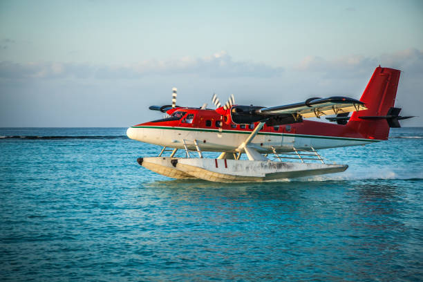 istock Seaplane landing in the ocean lagoon. 673532784
