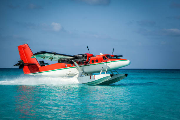istock Seaplane landing in the ocean lagoon. 673536998