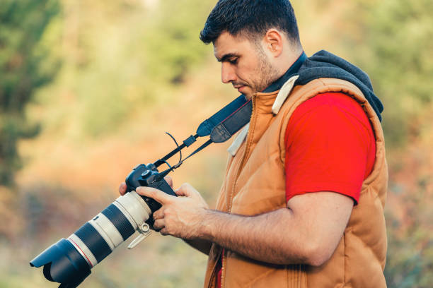 istock Portrait of a Photographer 673537892