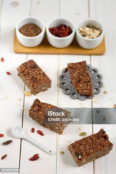 Energy Bars With Oat Goji Berries Sesame Chocolate And Honey Stock Photo - Download Image Now