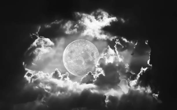 istock Dramatic of night sky and clouds with full moon. 673549232