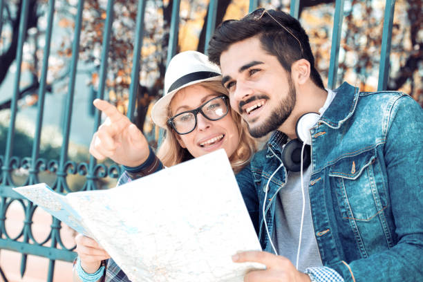 istock Couple of tourists 673559788