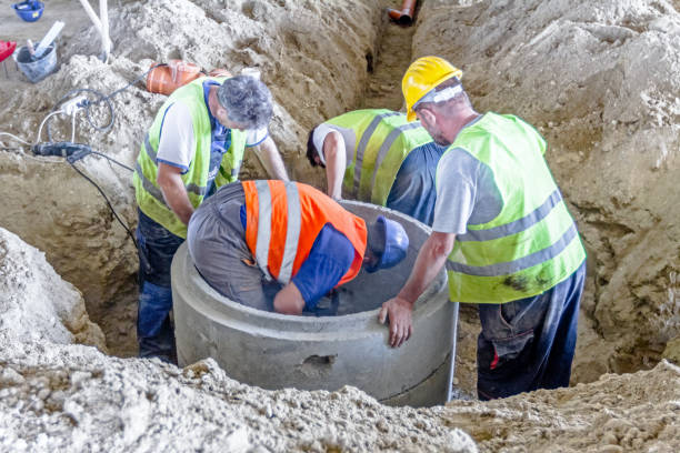 new manhole is under construction. - confined space imagens e fotografias de stock