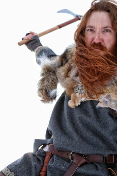 istock Battle Attack Medieval Winter Snow Viking Warrior, Animal Pelt 673574278