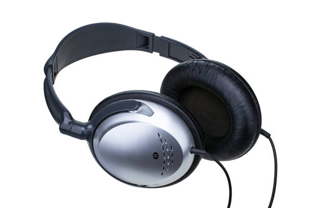 istock Silver headphones isolated on white background 673577690