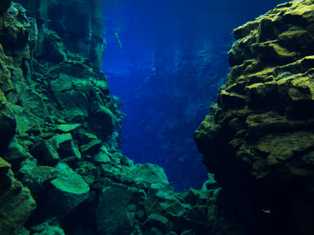 istock Inside of Valley with No Divers Visible at Continental Split at Silfra in Deep Section at Pingvellir National Park 673578196