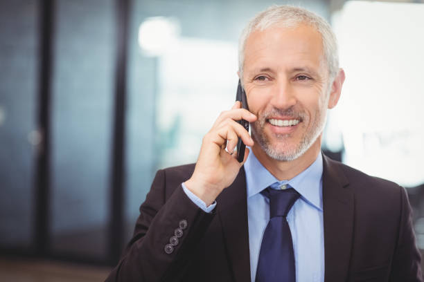 istock Businessman talking on mobile phone 673578390