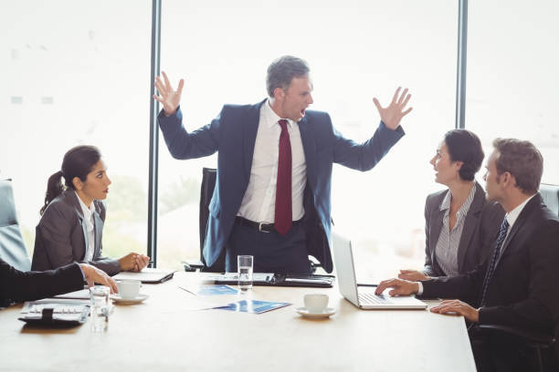 istock Businesspeople in conference room 673580476