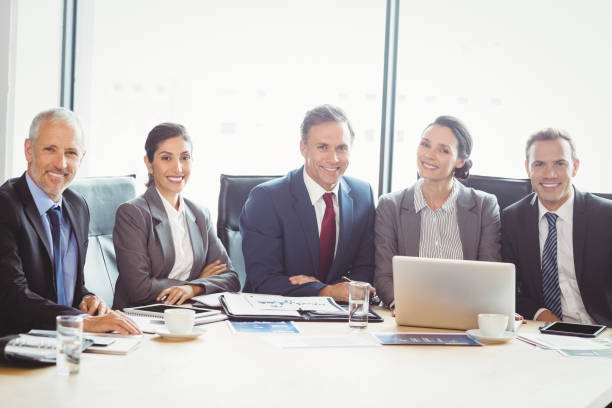 istock Businesspeople in conference room 673580632
