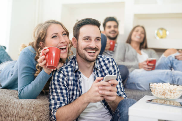 istock Friends having fun at home 673581036