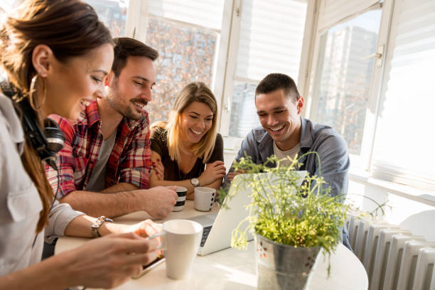 istock Friends having fun in front of comuter 673592884
