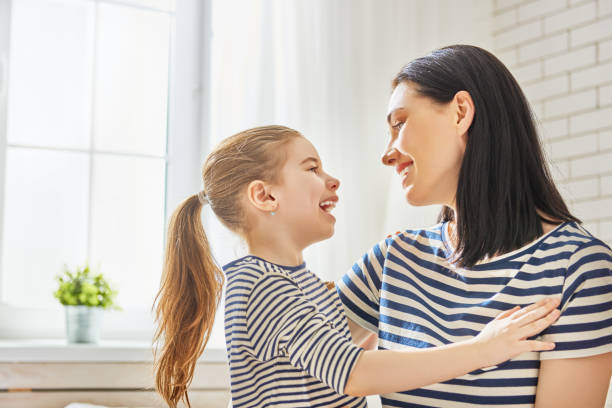 istock Mom and her daughter are playing 673593638