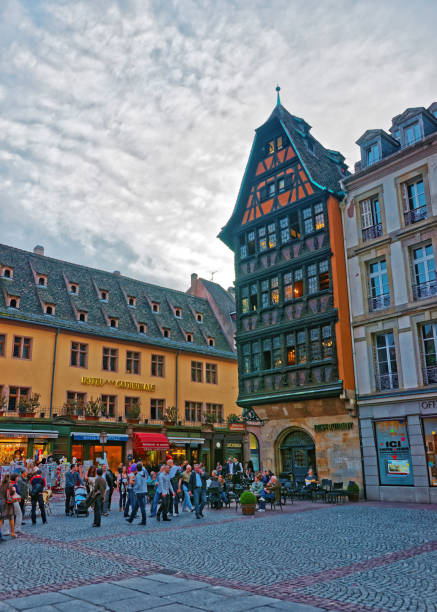Strasbourg, France - April 30, 2012: Kammerzell house on Cathedrale Square in the Grande Ile historic center of Strasbourg in France. People on the background
