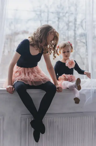 Portrait of a little girl and her teacher