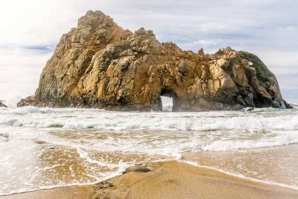 istock Rock at Pfeiffer Beach, California 673597462