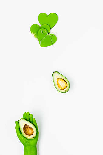 Fresh Green Avocado In Green Hand Stock Photo - Download Image Now - Avocado, Body Paint, Bright - iStock Fresh Green Avocado In Green Hand Stock Photo - Download Image Now - Avocado, Body Paint, Bright - iStock