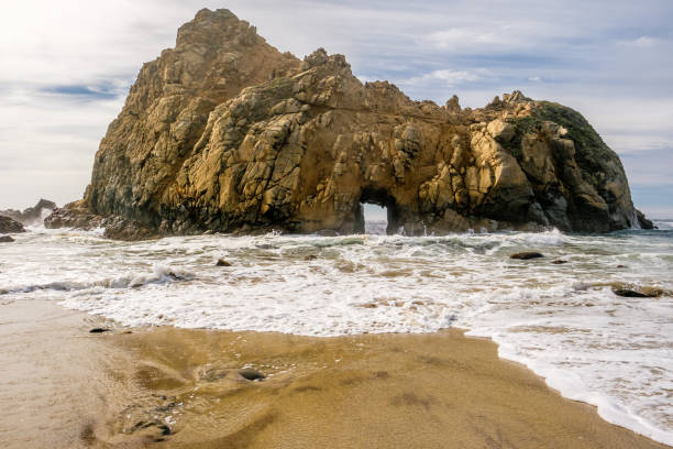 istock Rock at Pfeiffer Beach, California 673597584
