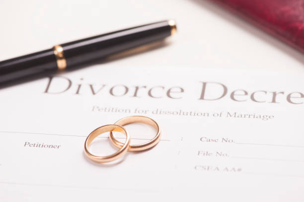 istock Wedding Rings And Wooden Gavel 673603280