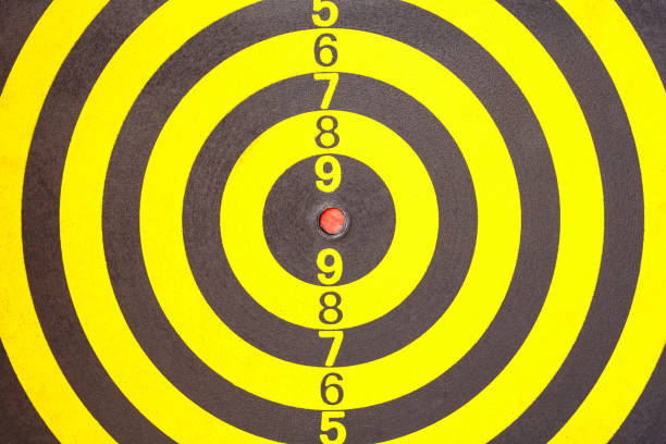 istock Texture of yellow and black dart board 673604878