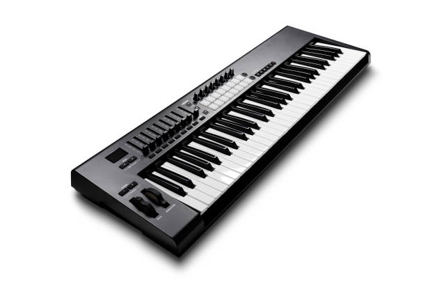 Electronic synthesizer piano isolated on white Electronic synthesizer (piano keyboard) isolated on white background with clipping path replay photos stock pictures, royalty-free photos & images