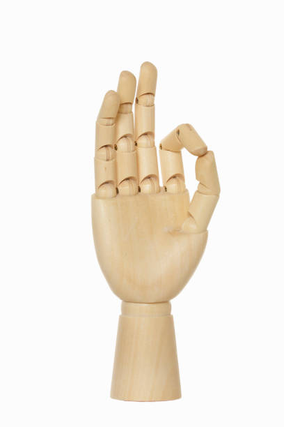 istock Wooden hand to make it OK 673622590