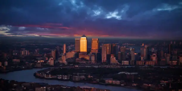 Beautiful sunset of modern part of city London, England, Europe. One of the leading centres of global finance.