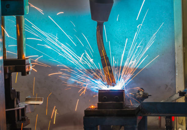istock welding robot in Industrial automotive 673637124