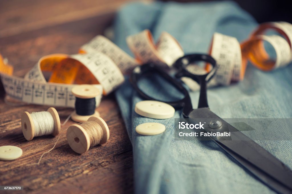 Sewing accessories on wooden Sewing Stock Photo
