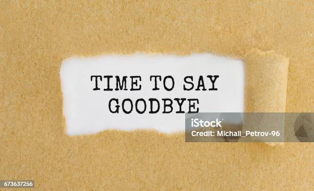 Text Time To Say Goodbye Appearing Behind Ripped Brown Paper Stock Photo - Download Image Now