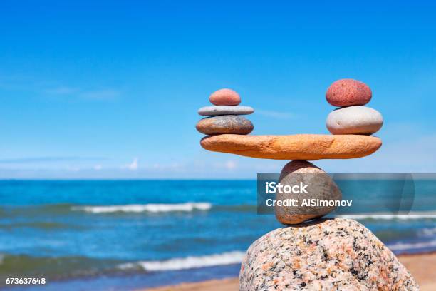 Concept Of Harmony And Balance Balance Stones Against The Sea Stock Photo - Download Image Now