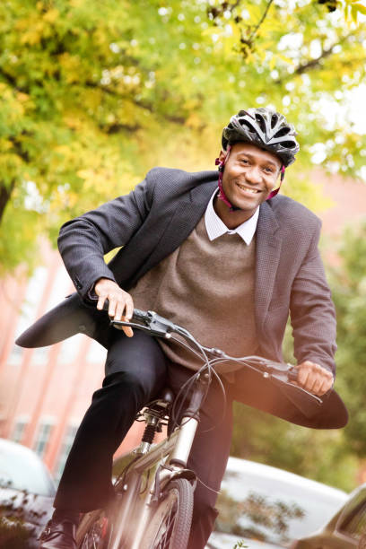 istock Single black male in his 30s speeding on his bicycle 673643054