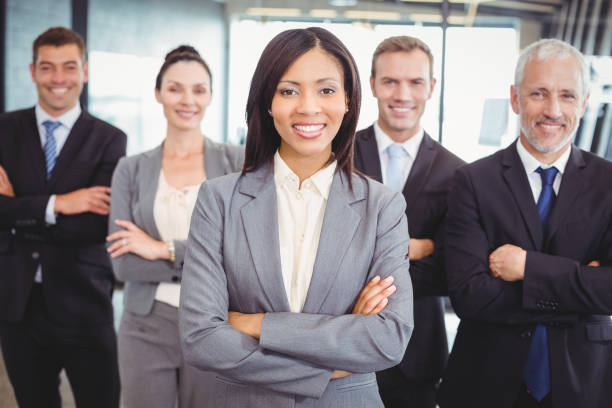 istock Confident business team in office 673651358
