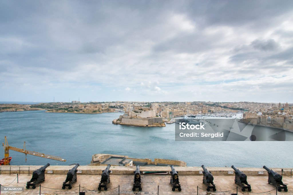 Saluting Battery. Valletta. Grand Harbor. Malta. Saluting Battery under Upper Barracca Gardens. Valletta. Grand Harbor. Malta. Bay of Water Stock Photo