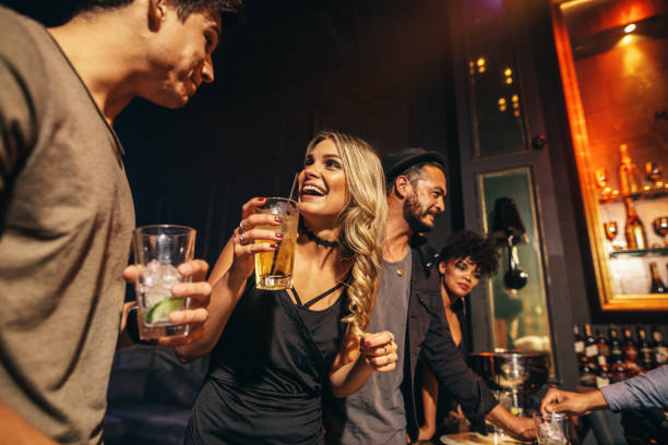 istock Group of people having fun at nightclub 673668122
