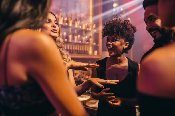 istock Group of people in the pub 673671752