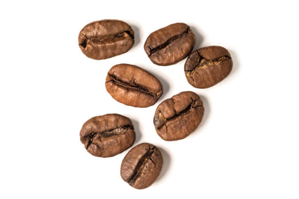 istock Grains of coffee on a white background 673673544