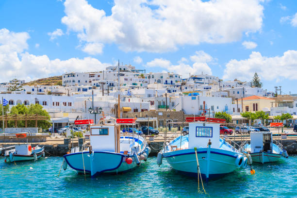 Fishing boats in Naoussa port, Paros island, Greece The island of Paros is one of the most famous Greek islands of the Aegean Sea and it belongs to the Cyclades islands archipelago. paros stock pictures, royalty-free photos & images