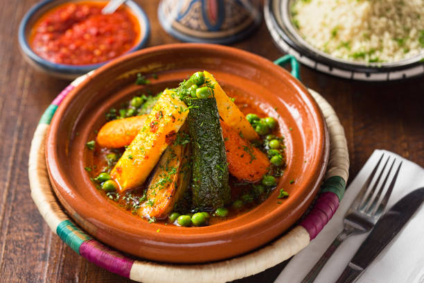 istock Vegetable tajine with rice and tomato sauce 673678976